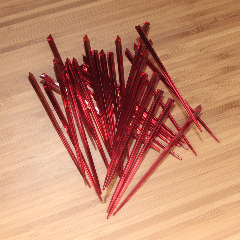 3.5" red prism plastic skewer picks on bamboo wood